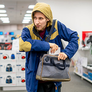 Young male juvenile caught shoplifting. Title: A Strong Defense For Juveniles Facing Shoplifting Charges.